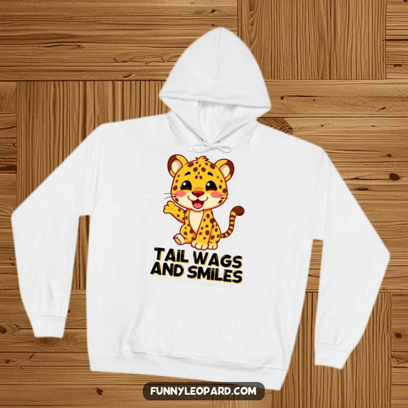 Funny hoodie showcasing a delighted leopard character wagging its tail with immense glee, perfect for spreading cheer and staying warm.
