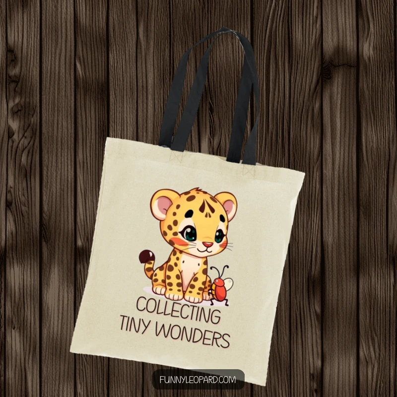 Funny tote bag illustrating a curious leopard cub cub tilting its head at a wiggling bug, embodying gentle fascination.